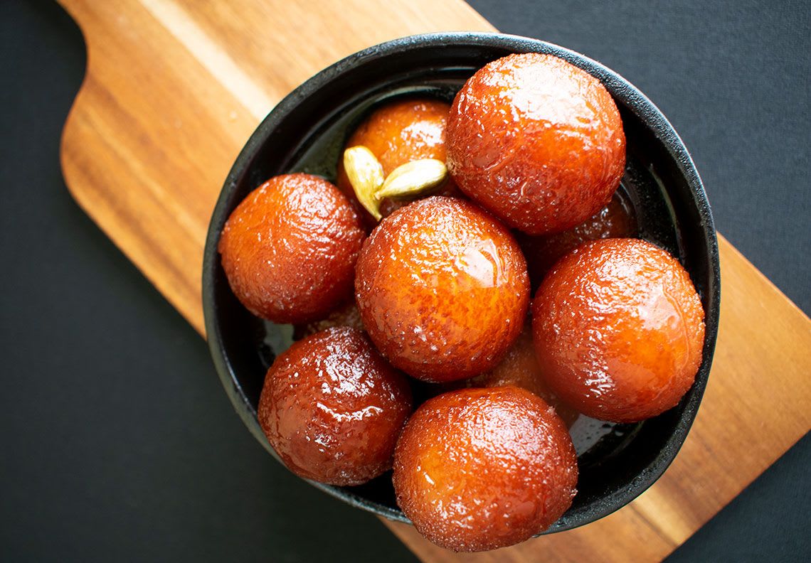Sangam Sweets And Namkeen - Logo