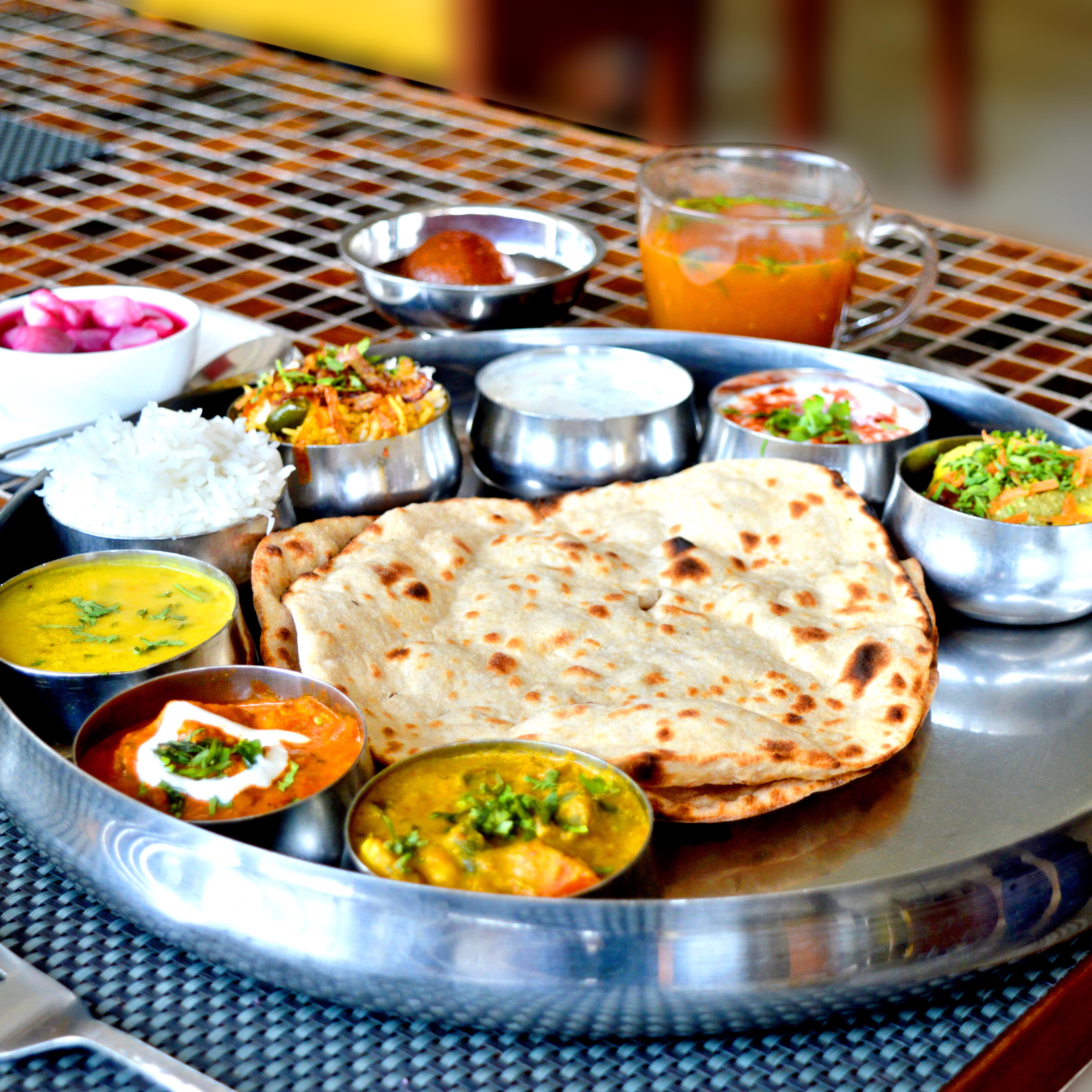 Santrupti Vegeterian - Logo