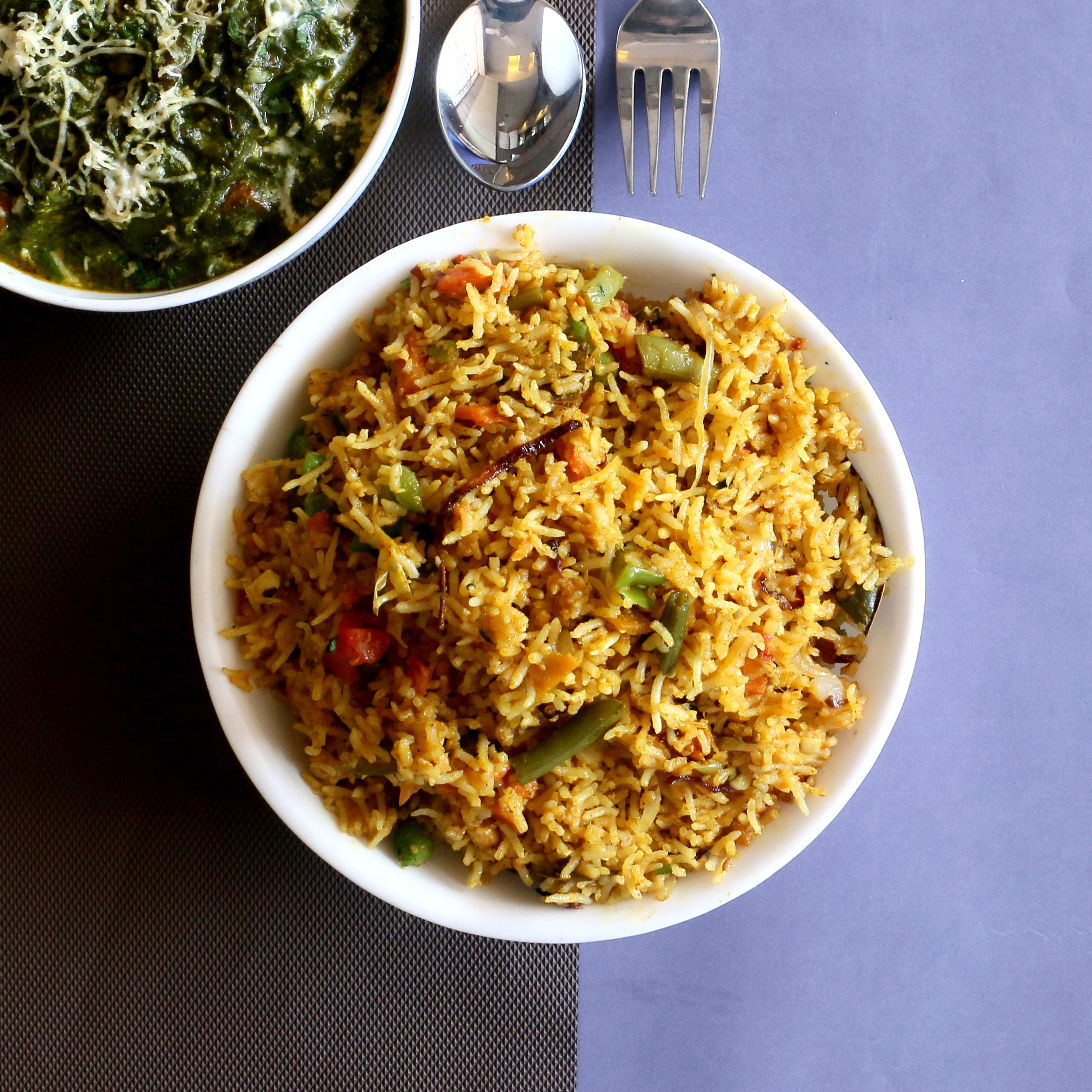 Sapna Veg Restaurant - Logo
