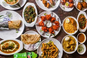 Savjis Roll N Biryani - Logo