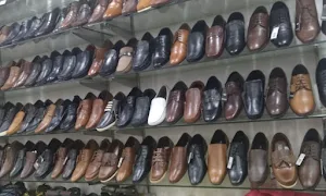 Saxena Foot Wear - Logo