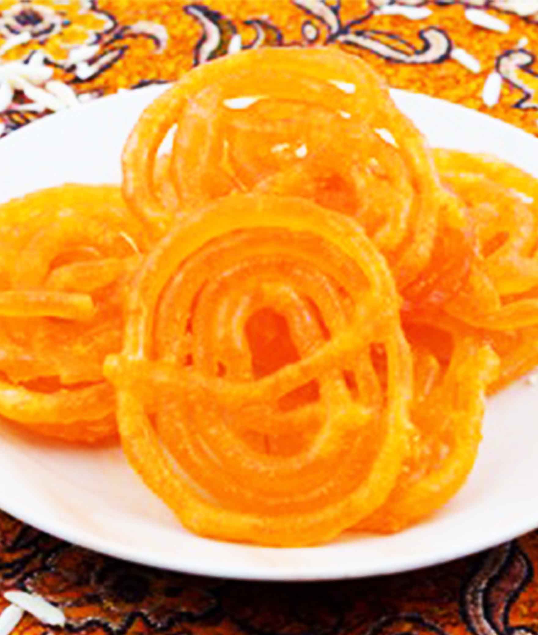 Shalini Malkar Sweet Mart - Logo