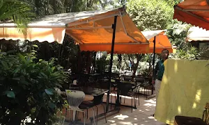Sharvaree Restaurant - Logo