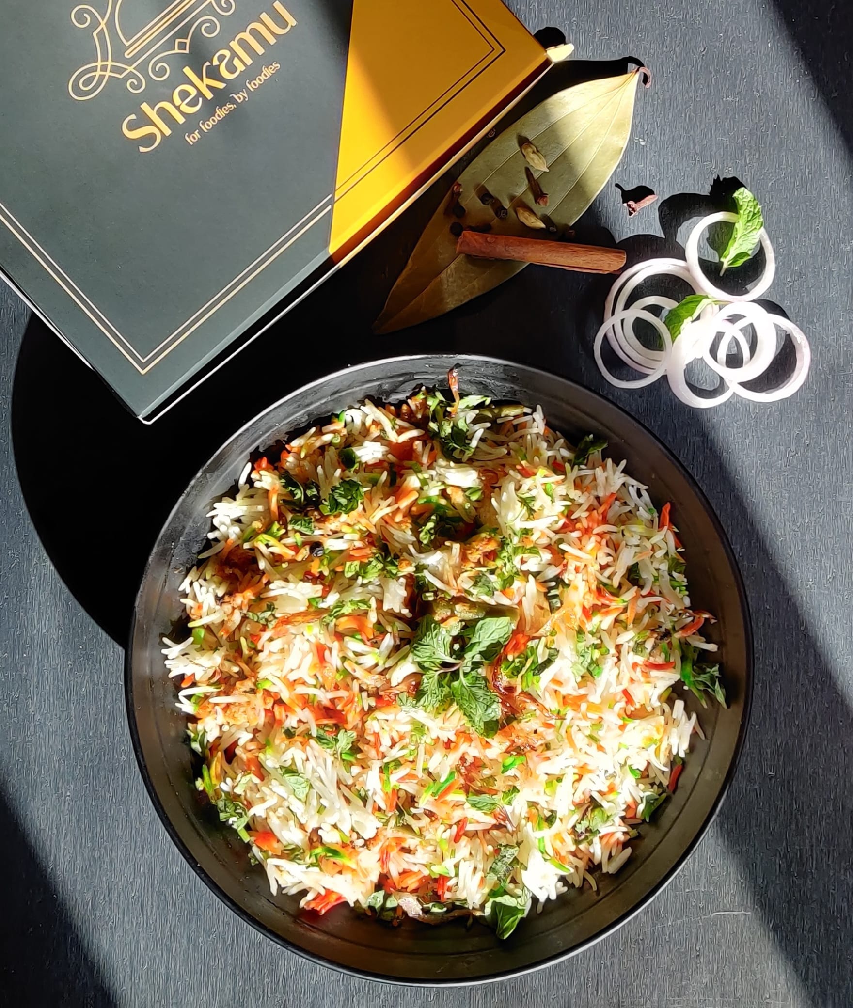 Shekamu Biryani - Logo