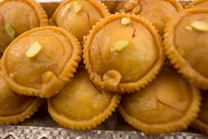 Shree Mahalakshmi Sweets - Logo