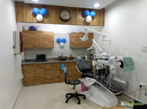 Shreenath Dental and implant centre - Logo