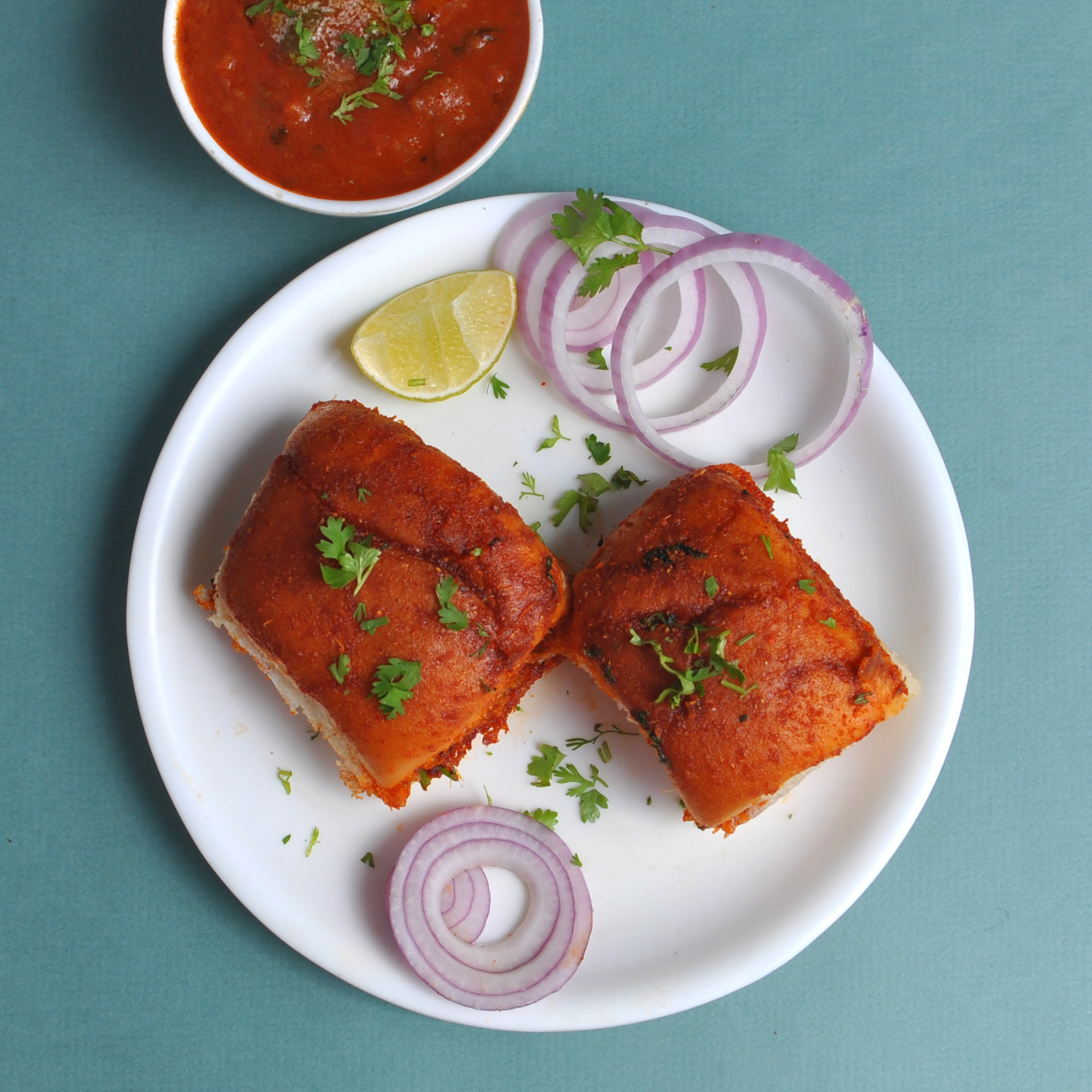Shreenath Madanath Pavbhaji and Pulao Center - Logo