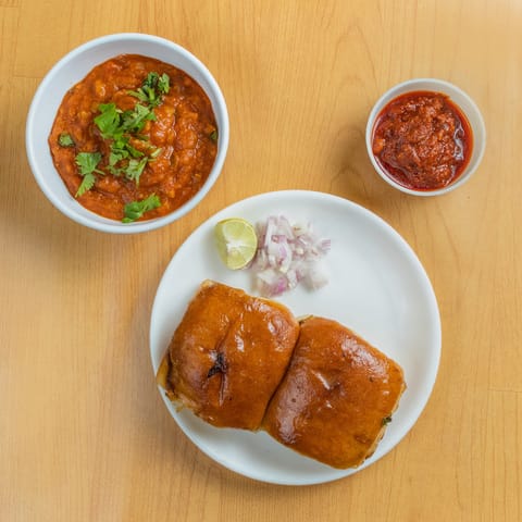 Shreenath Pavbhaji Pulao Cuisine - Logo