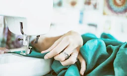 Shri Ambika Textiles - Logo