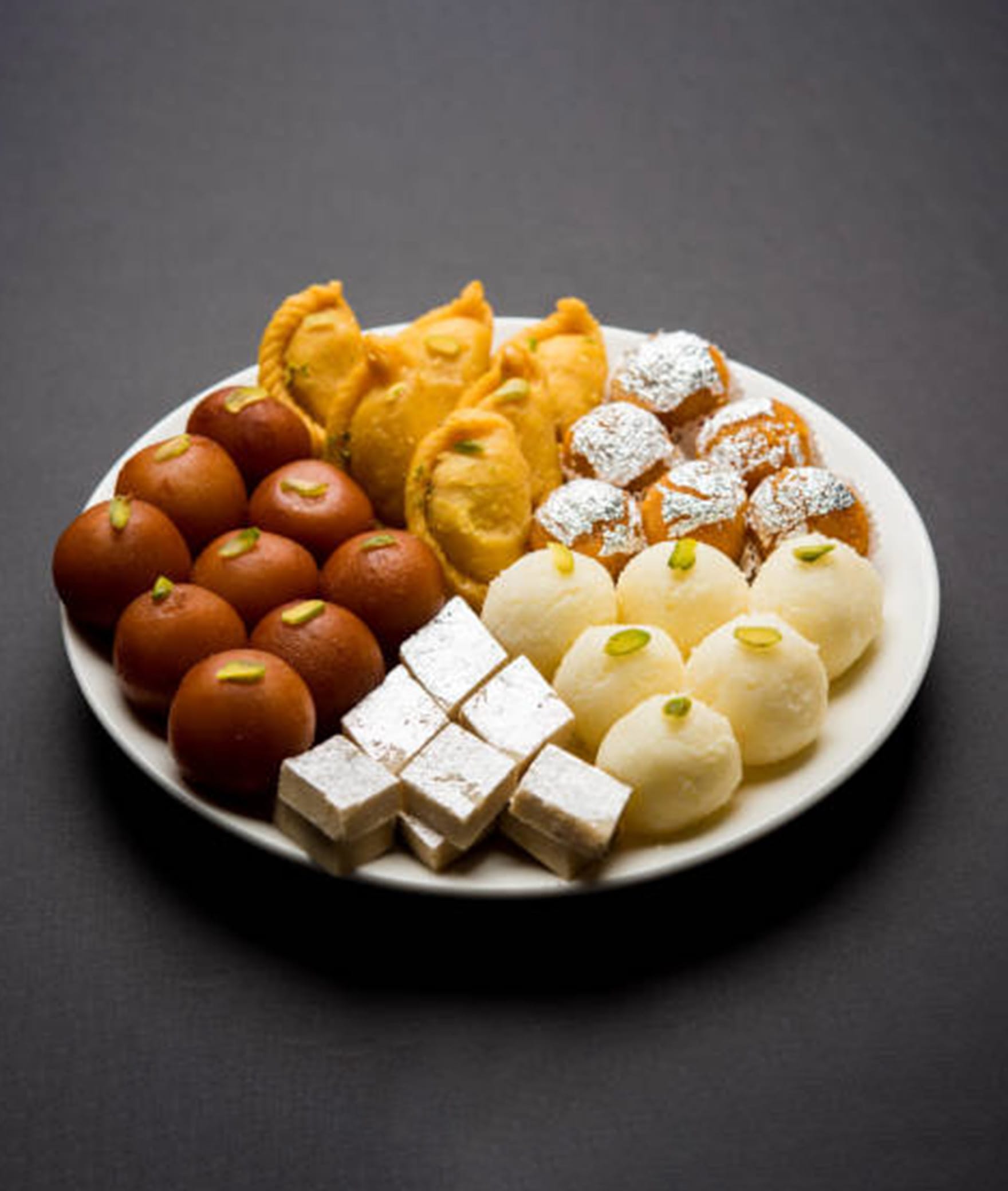 Shri Krishna Sweets And Bakers - Logo