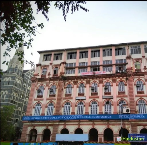 Siddharth College Of Commerce And Economics - Logo
