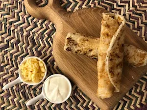 Singh's Delhi Paratha & More - Logo
