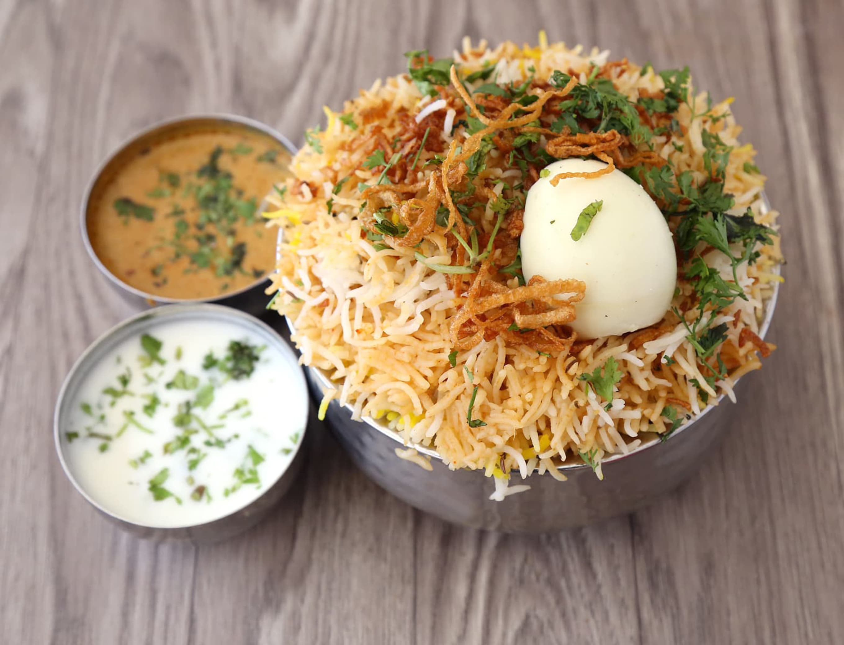 Singh s Mehfil Biryani & Rolls - Logo