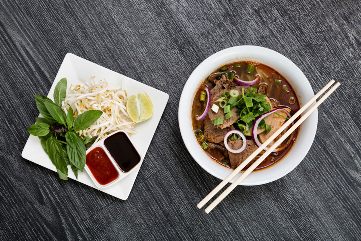 Sing's Asian Kitchen - Logo