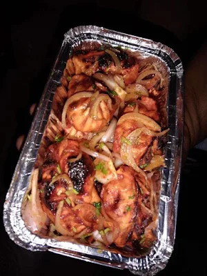 Sizzling Nepali Momos - Cover photo
