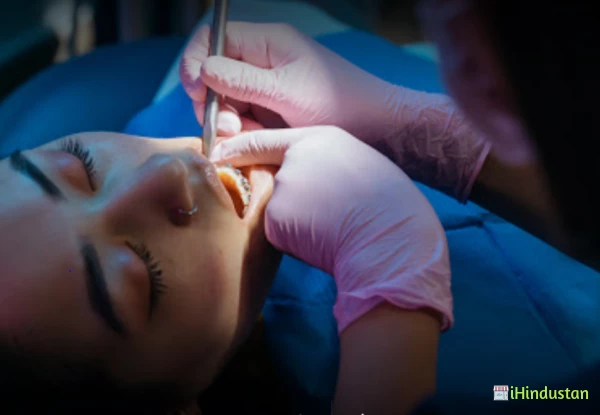 Soman's Cosmetic Dental Clinic - Logo