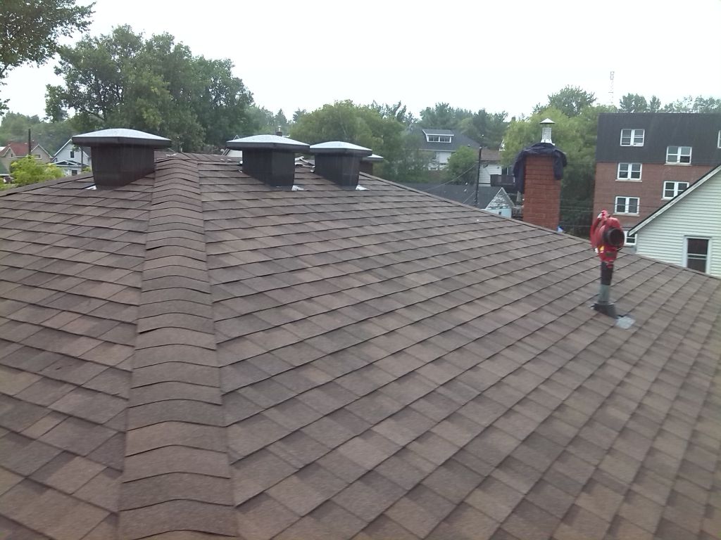 Sonny&s;s Roofing and Siding LTD. - Logo