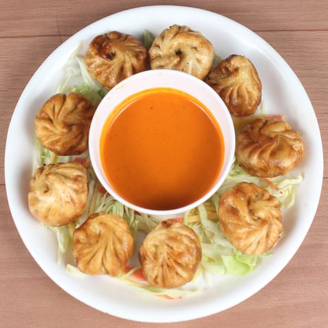 Spicy Momo Restaurant - Logo