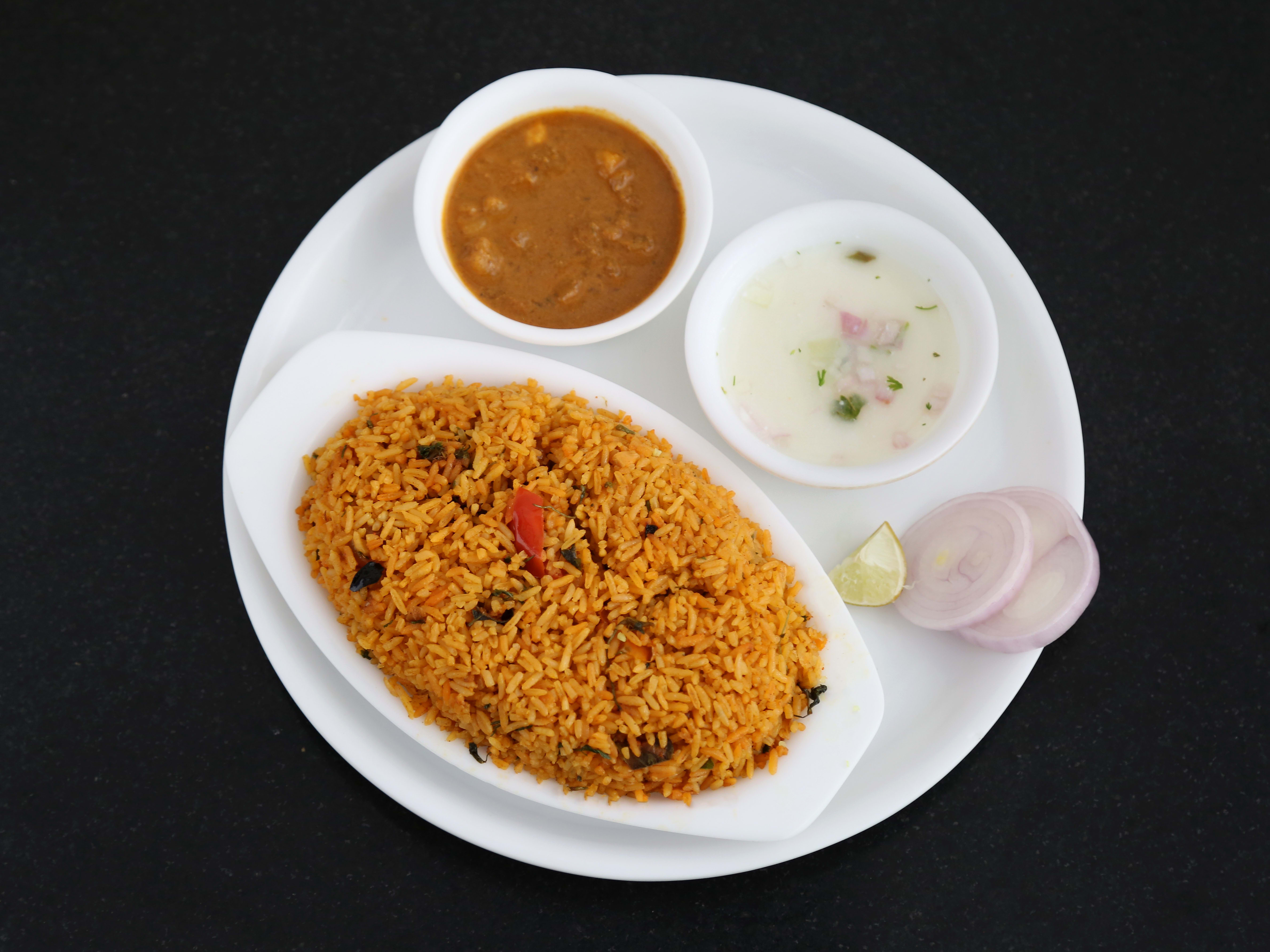 Sri Anjaneya tiffins and curries - Logo