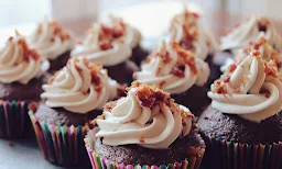 Sri Muttueshwaran Bakery & Sweets - Logo