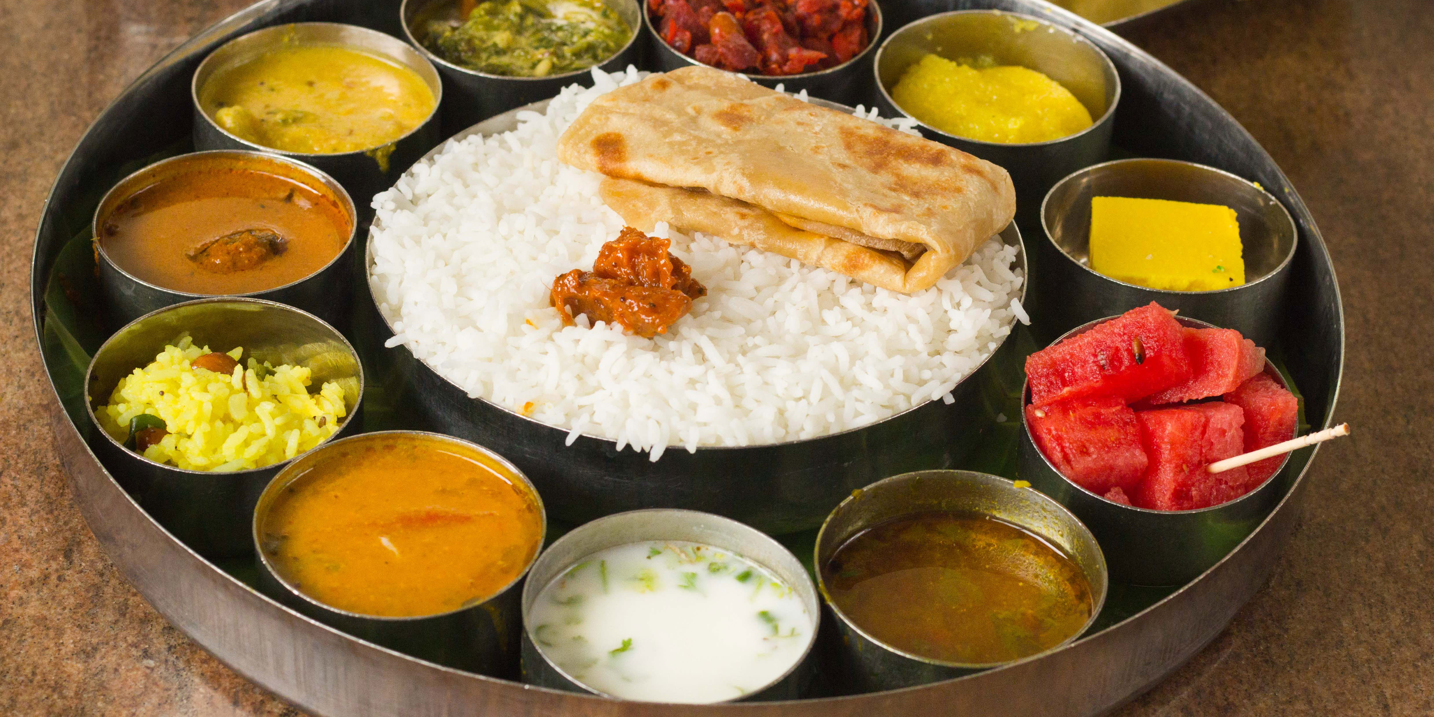 Sri Paarvathi Bavan Ssweets and Veg Restaurant - Logo