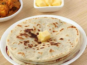 SS Amritsari Kulcha Corner - Logo