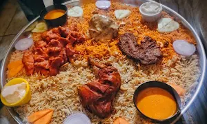 Strangers Mandi & Biryani - Logo