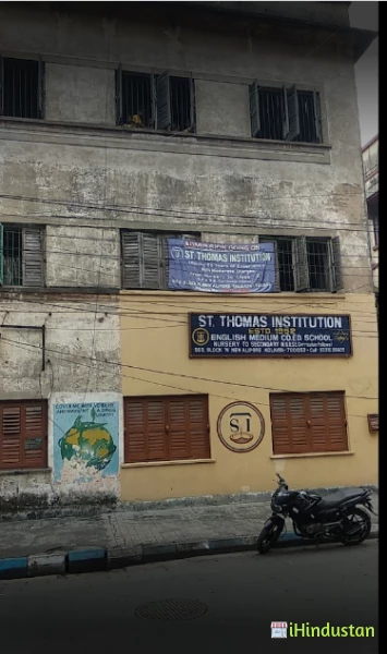 St. Thomas Institution New Alipore - Logo