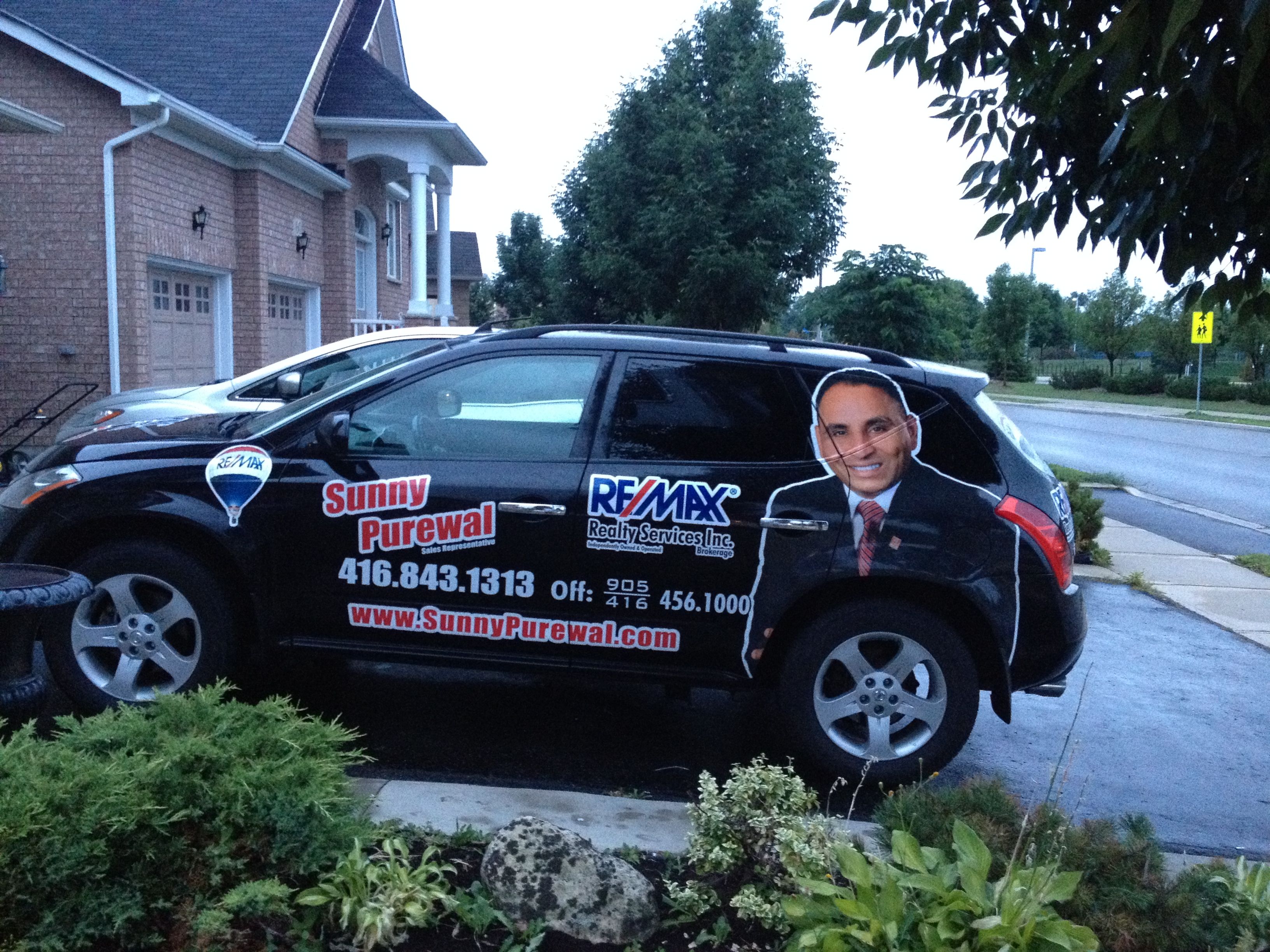 SUNNY PUREWAL-Remax Realty Services Inc. - Logo