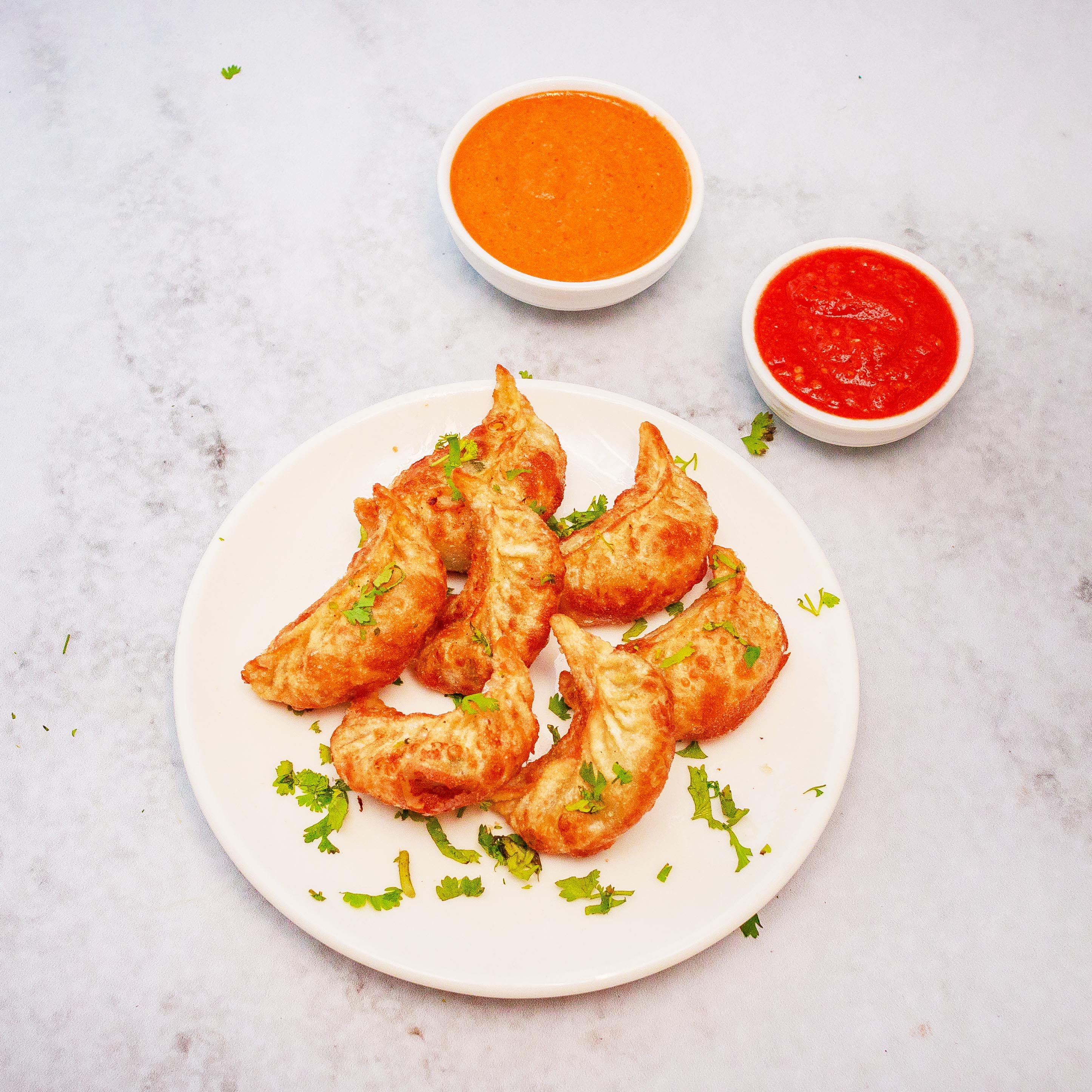 Suraj Lama Momos - Logo