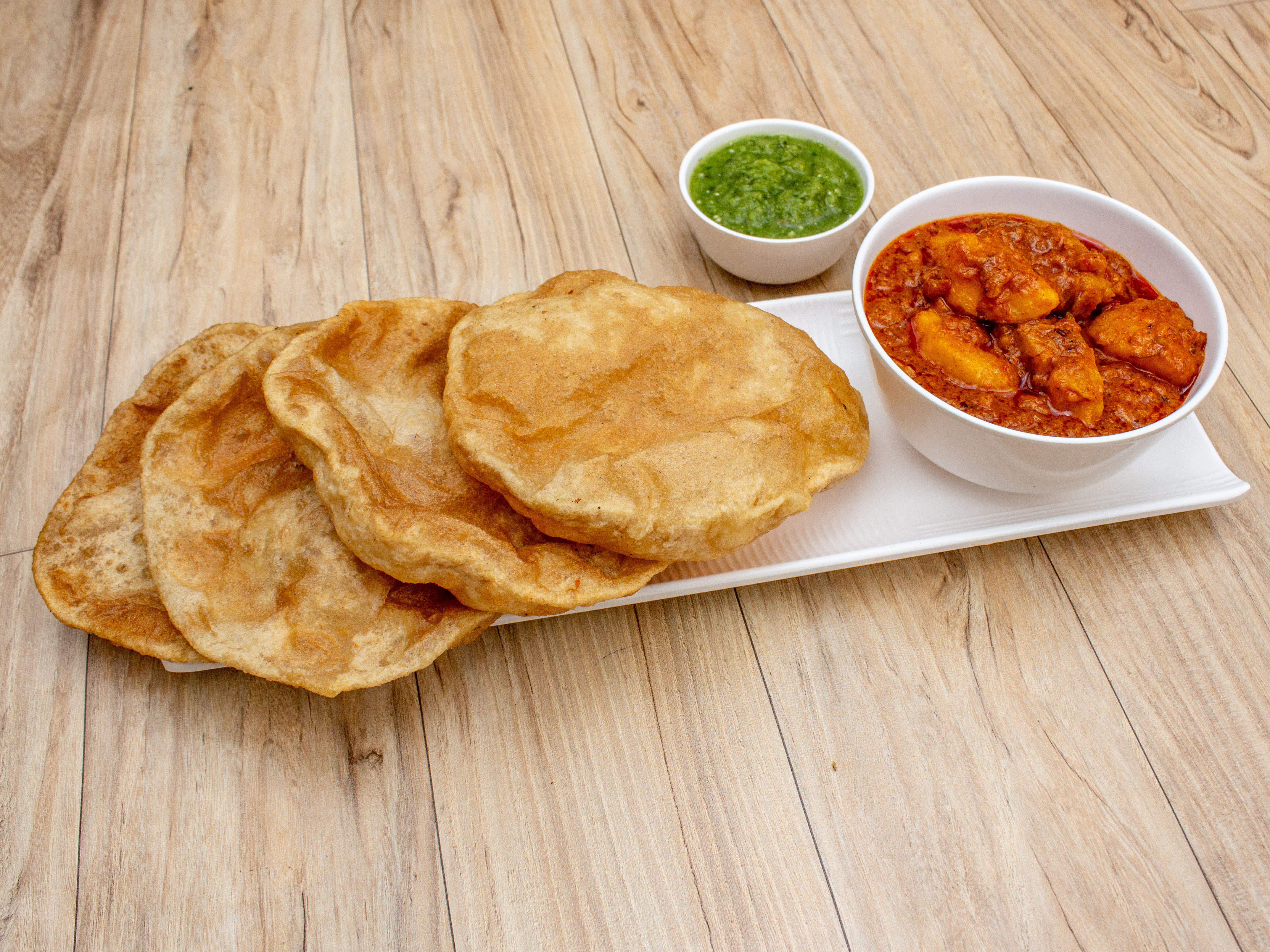 Surati Tasty Aalupuri And Rasawala Khaman - Logo