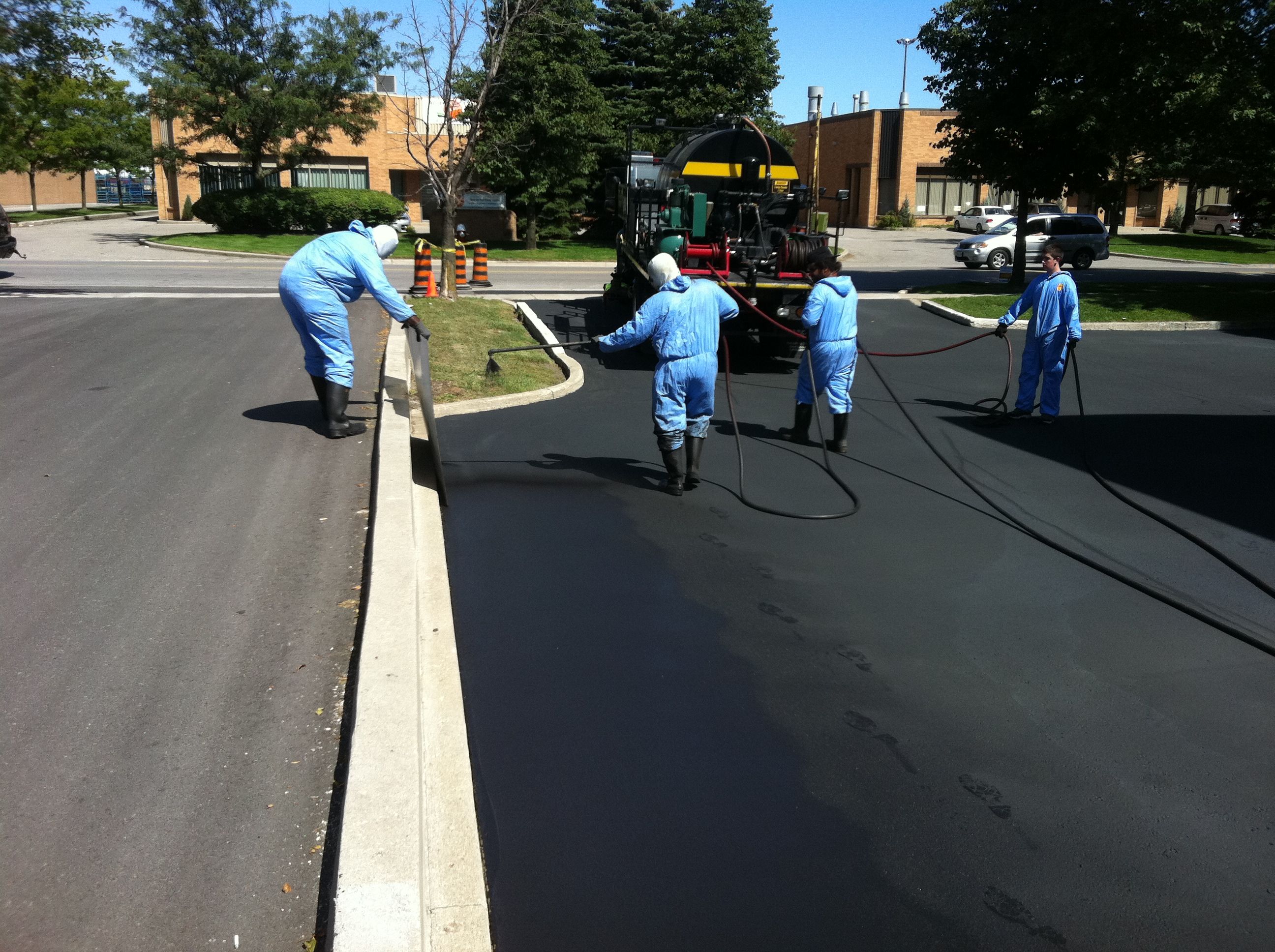 Sure Seal Pavement Maintenance Inc - Logo