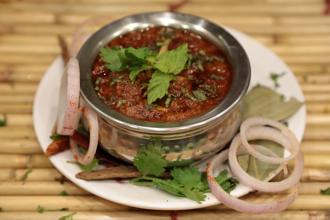 Swadanusar - Curries And More - Logo