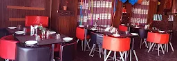 Swastik Veg Restaurant, Shree Nath Tower - Logo
