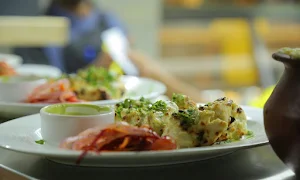 Taawoon Restaurant - Logo