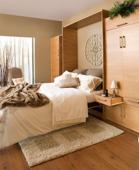 Tailored Living featuring Premier Garage of Saskatoon - Logo