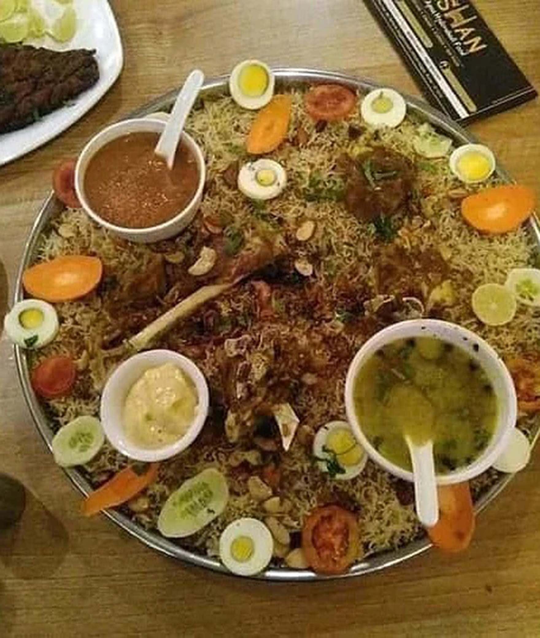 Taj Mahal Briyani and Prime BBQ Bike - Logo
