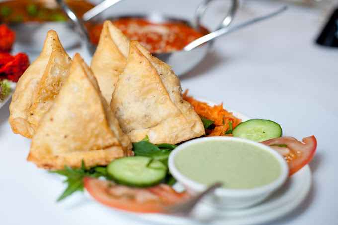 Taj Tandoori Indian Restaurant - Logo