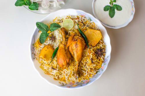 Tanisha's Royal Hyderabadi Biryani - Logo