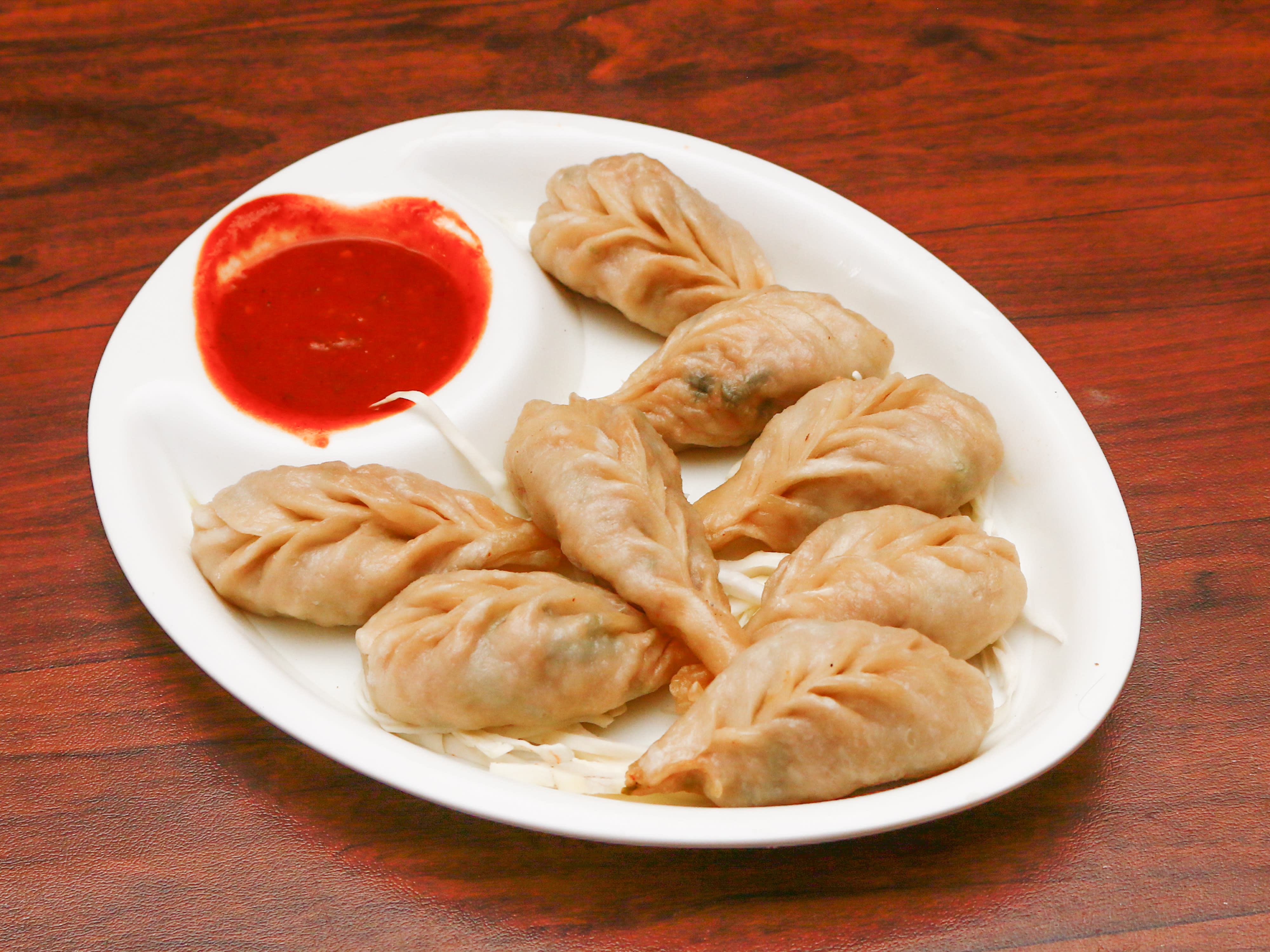 Tasty Momos - Logo