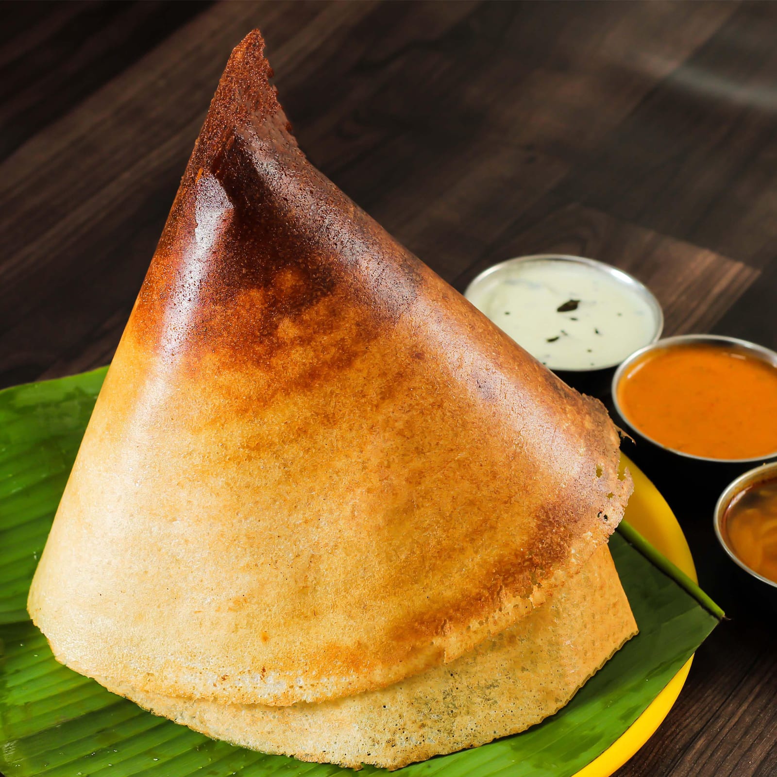 Tattu idly and variety dosa shop - Logo