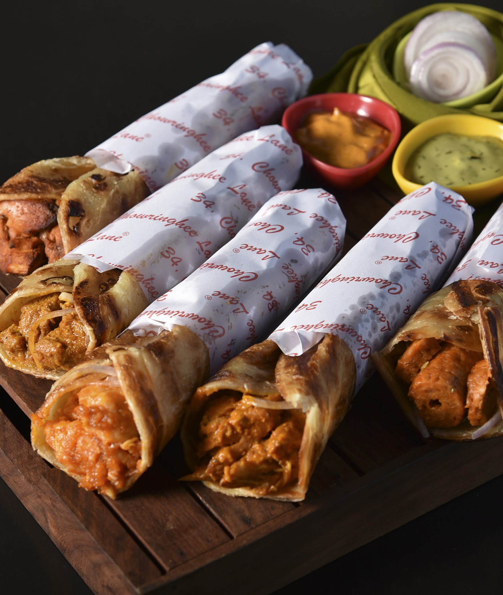 Tawa Garam Kathi Roll - Logo