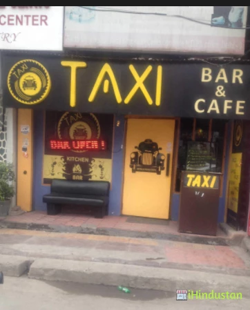 Taxi Bar & Cafe - Logo