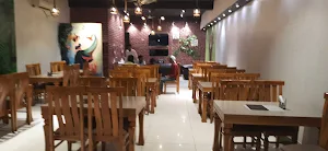 Tejaswini The Multi Cuisine Restaurant - Logo