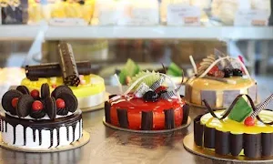 Temptation Cake's And Cafe - Logo