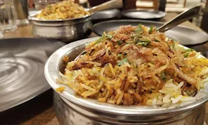 Ten Tables Tandoor Family Restaurant - Logo