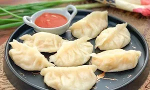 The Momos - Cover photo
