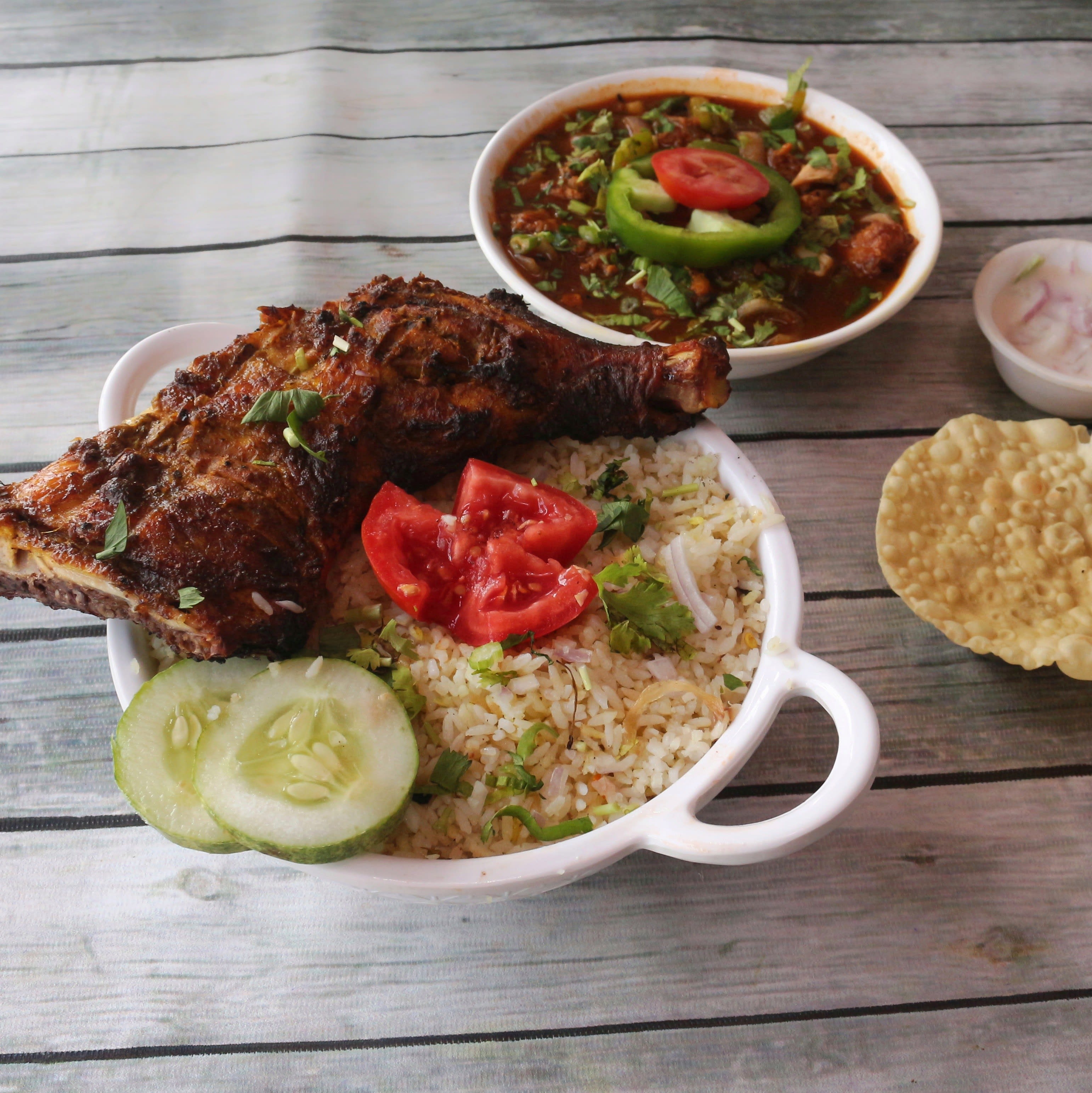 Thalassery Restaurant - Logo