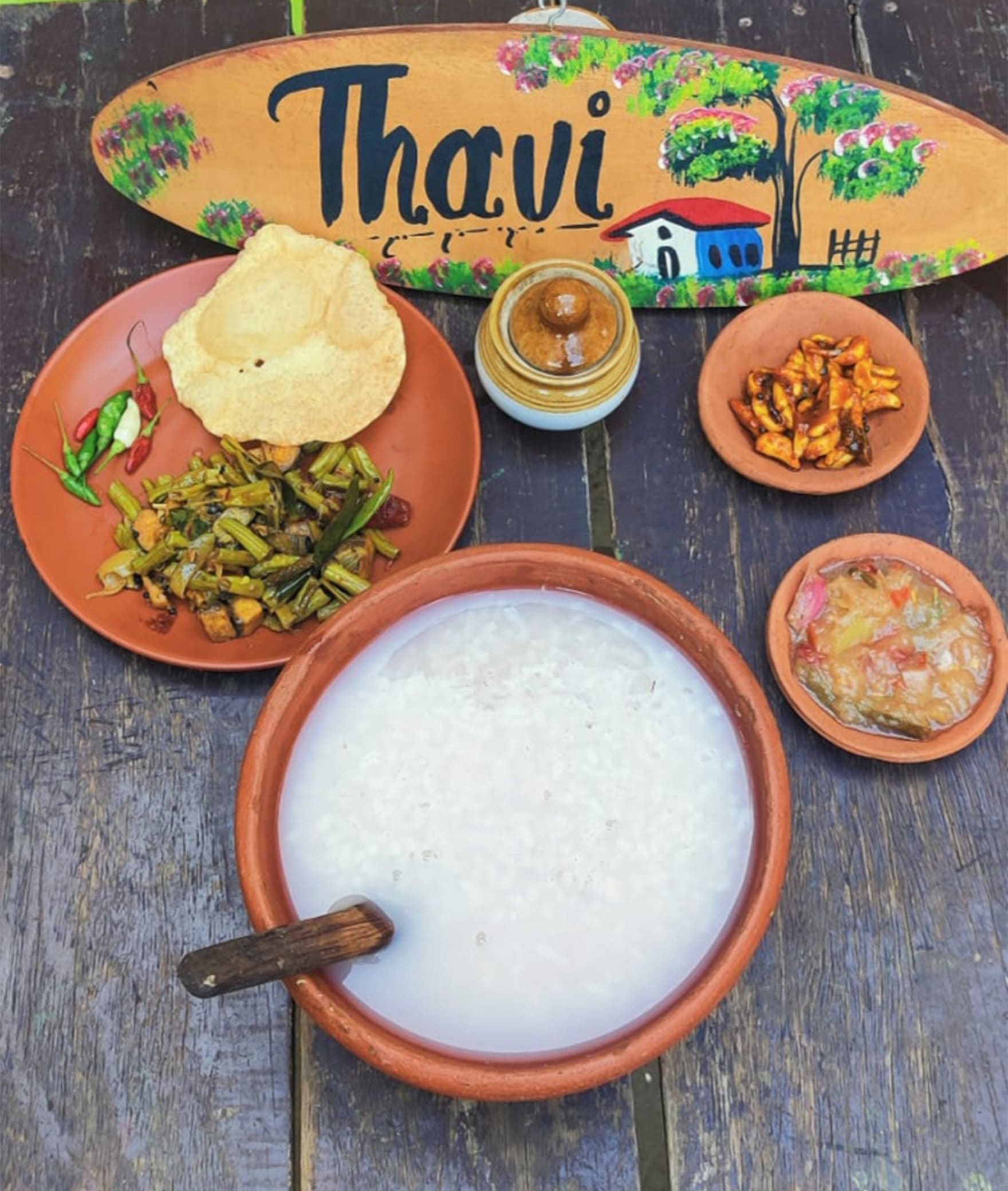 Thavi Restaurant - Logo