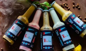 Theka Cafe - Logo